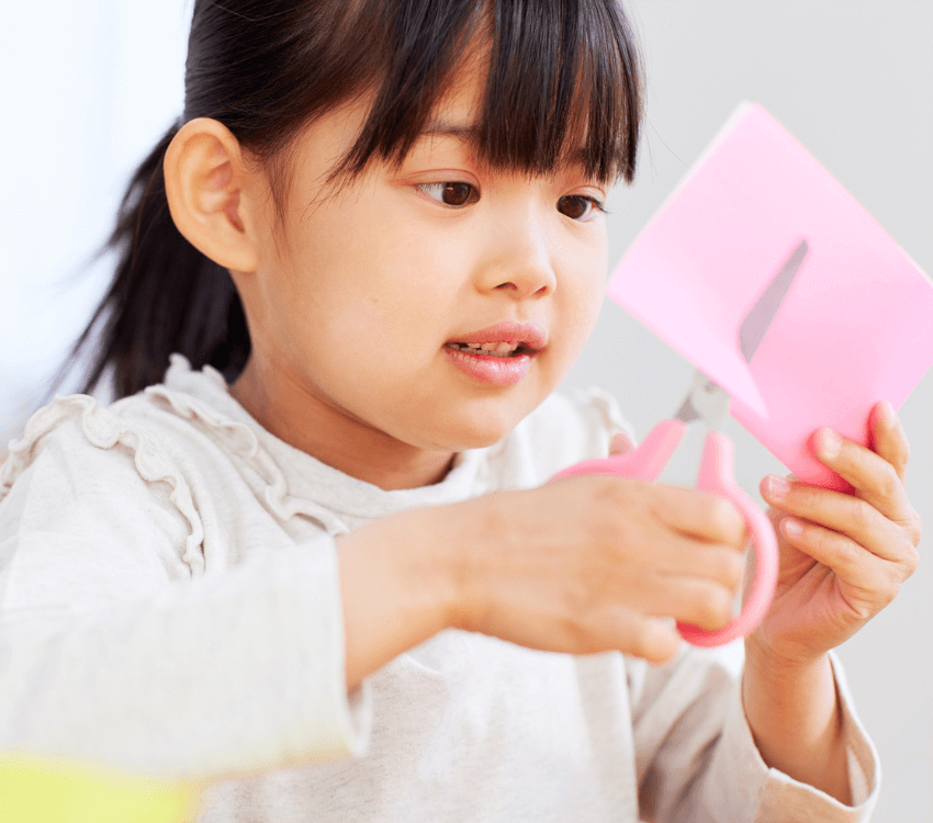 Child- using -scissors