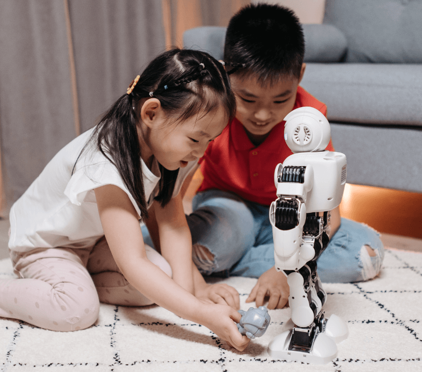 child- playing- with -robot- toy